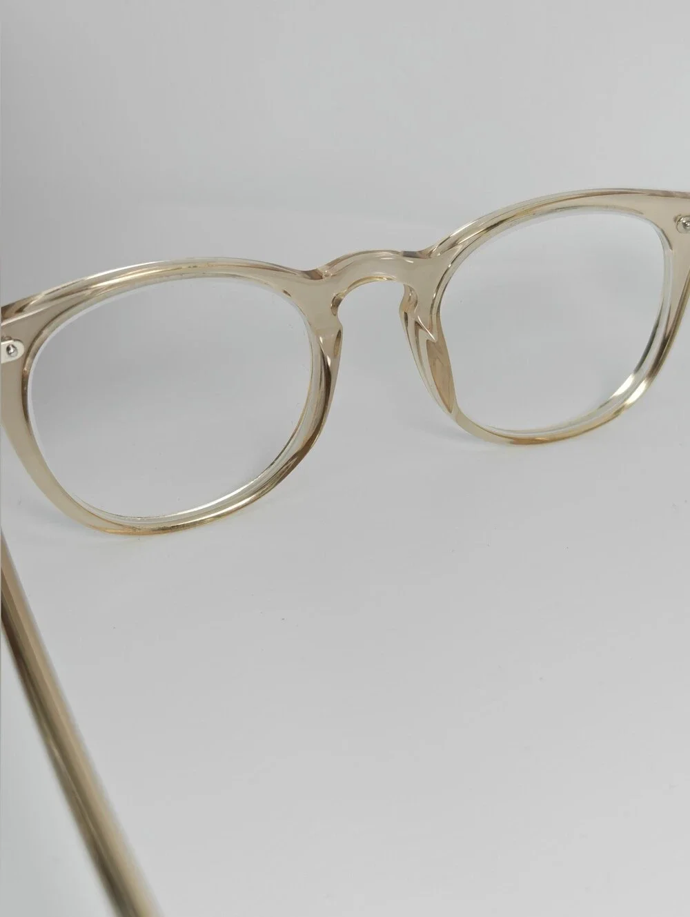 Ona. RFLKT. Clear Beige Round Frame Glasses.